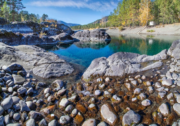 A small lake with amazing water color Valley of the Katun River Altai