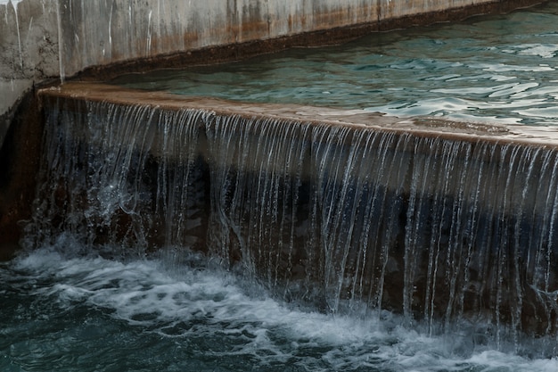 Small man-made artificial waterfall,height difference in the artificial channel