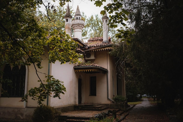 Small mosque in the green botanical garden