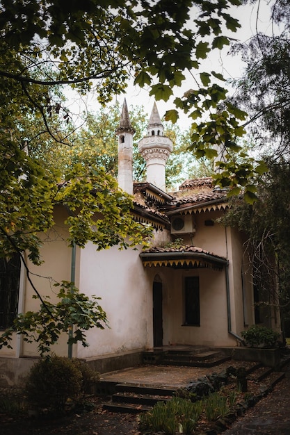 Small mosque in the green botanical garden