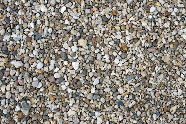 Small multi-colored stones as background. Abstract natural texture. Stones pattern.