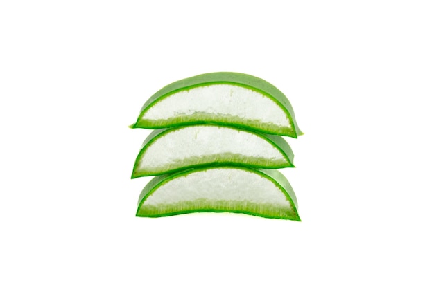 Small pieces of an aloe vera leaf forming a pile on a white background