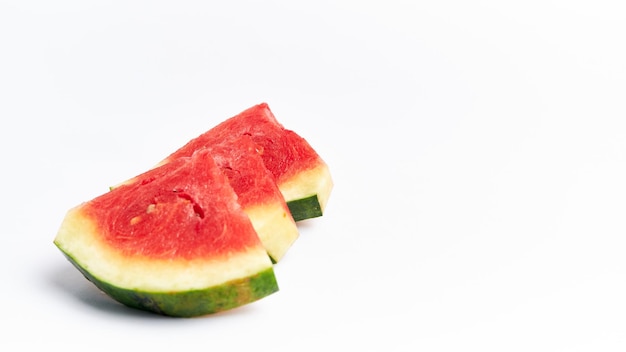 small pieces of fresh watermelon on white background