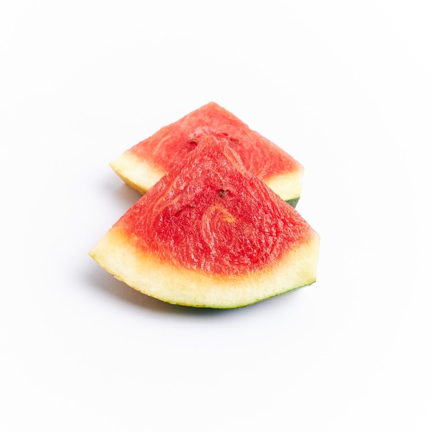 small pieces of fresh watermelon on white background