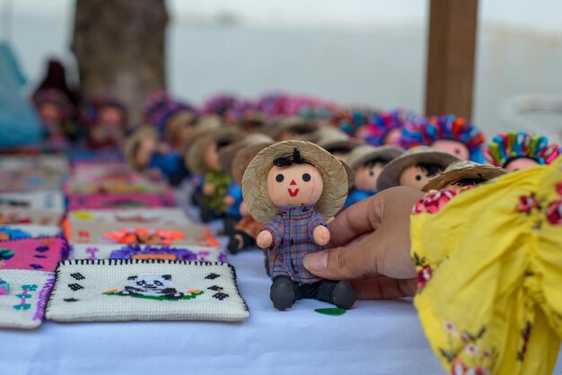 Small rag mexican doll in a street store Mexican handicraft