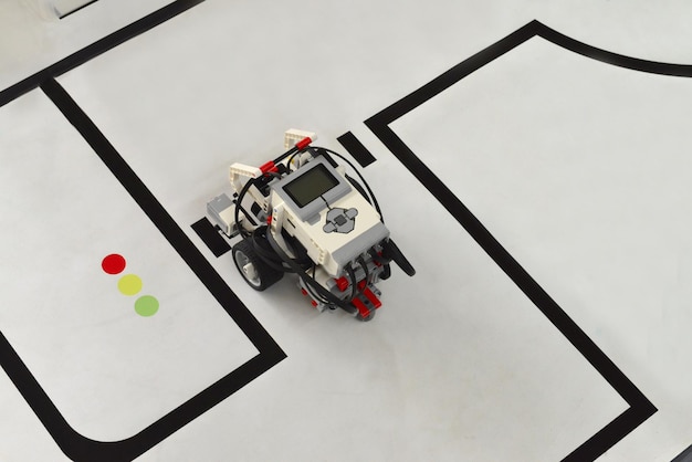 Small robot driving on painted roads handmade model design of electonic machine car it modeling