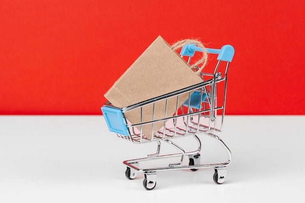 Small shopping cart with paper bags