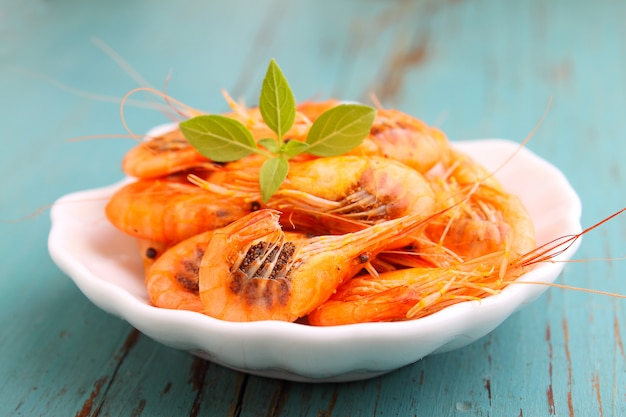 Small shrimp (crustaceans) in a blue background. traditional Odessa cuisine