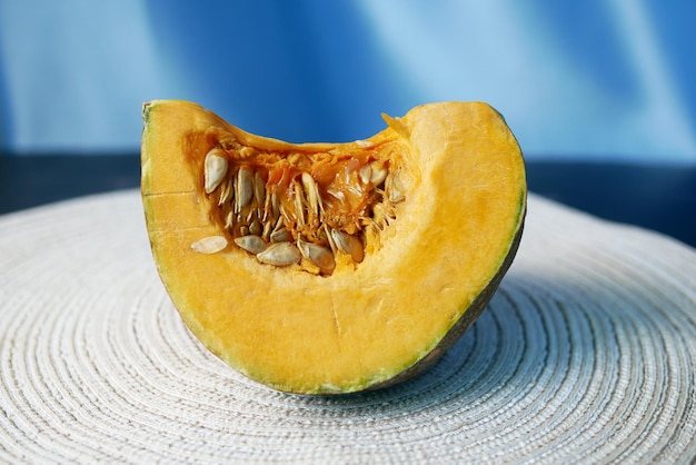 Small slice of pumpkin in a bowl on table