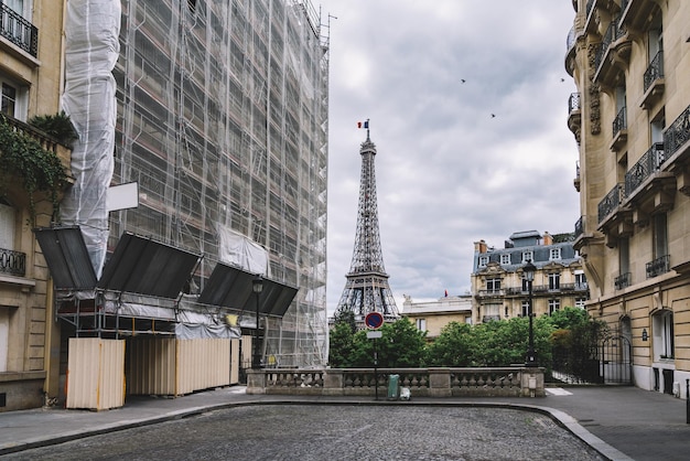 small street in paris with view on the famous eifel tower