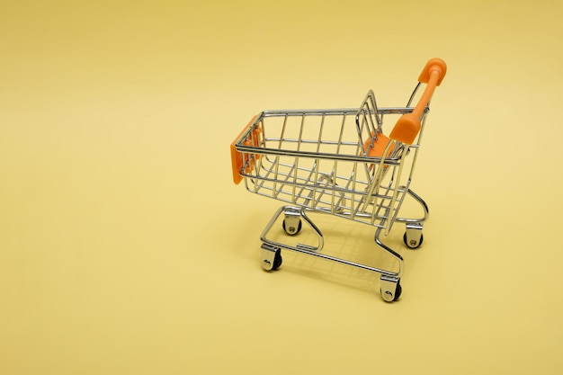 Small supermarket grocery push cart for shopping shopaholic