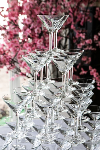 Small Tower Of Empty Champagne`s Or Wine Glass In Wedding Reception Party