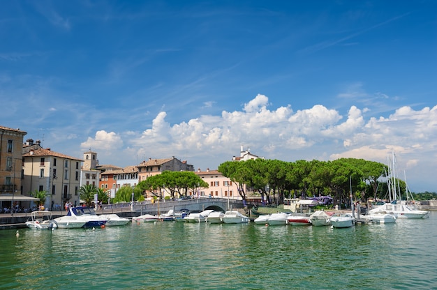 Small yachts in harbor in Desenzano, Garda lake, Italy