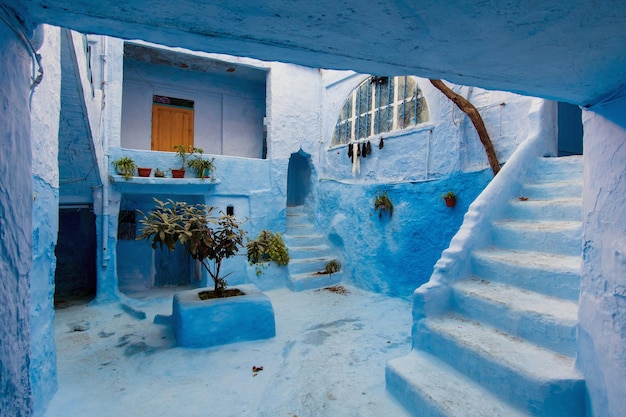 Small yard between houses in Chefchaouen the Blue city in Morocco