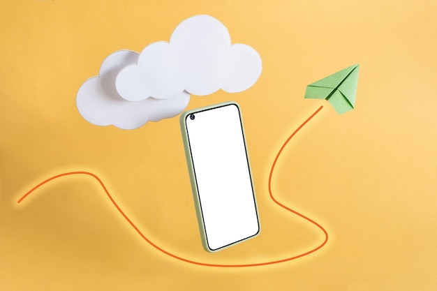 Smart phone cloud and paper plane with growing yellow background Growth and successful concept