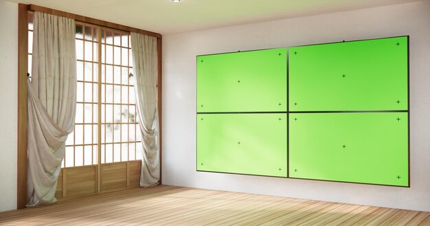 Smart Tv Mockup with blank green screen hanging in modern white empty room interior minimal designs