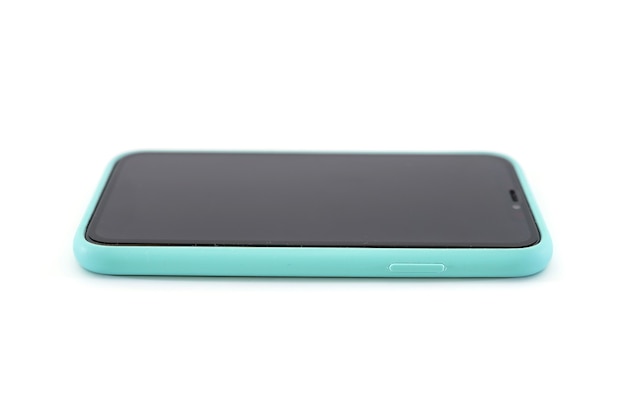 Smartphone in a blue case isolated on a white background. side view