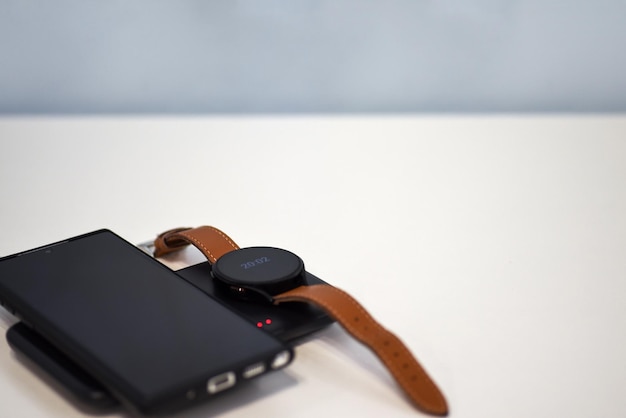 Smartphone and watch charging on wireless charger