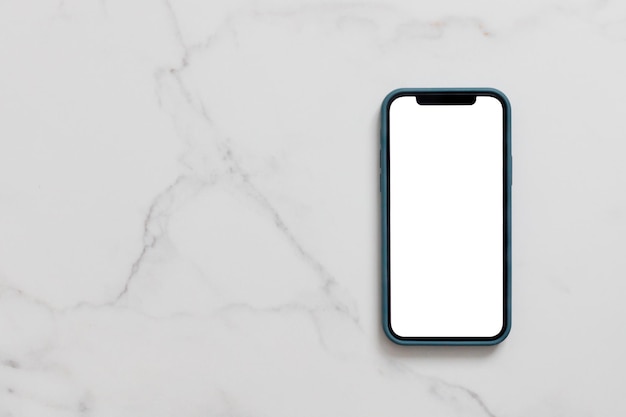 Smartphone with blank white screen in case on marble table Mobile phone mock up