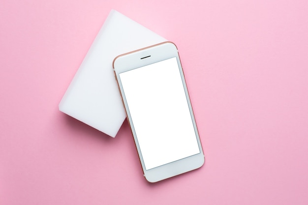 smartphone with white screen on pink