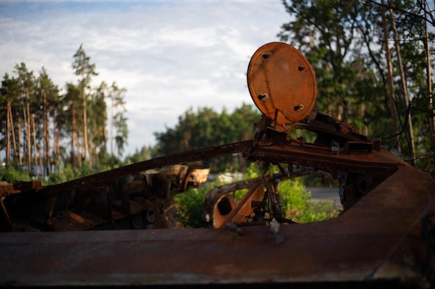 The smashed and burned modern tank of the russian army in ukraine in the war in