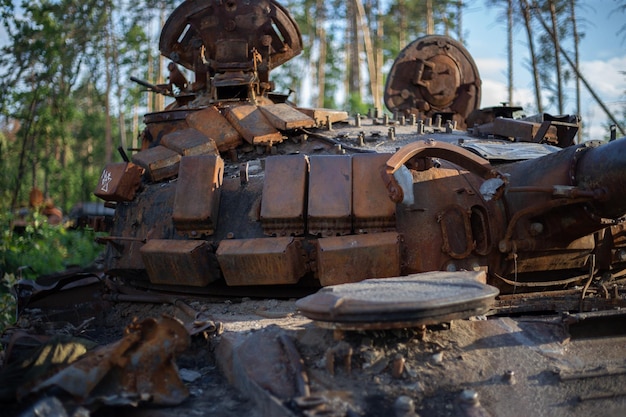 The smashed and burned modern tank of the russian army in ukraine in the war in