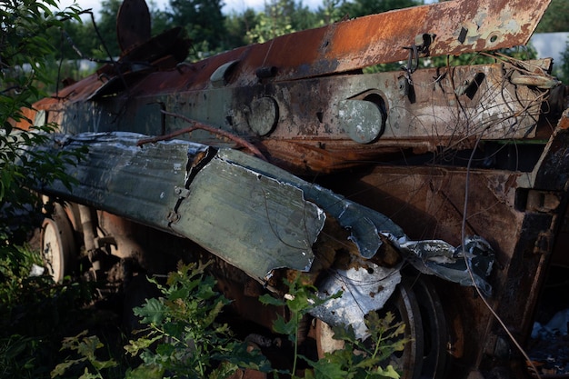 The smashed and burned modern tank of the russian army in ukraine in the war in