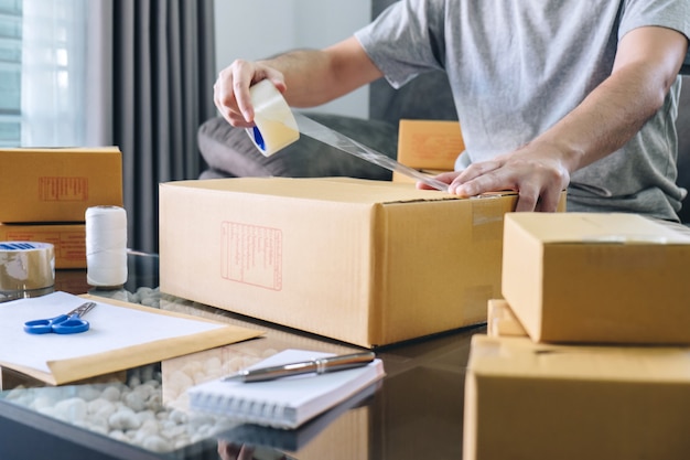 SME freelance man working with packaging their packages box delivery online market