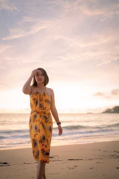 Smile Freedom and happiness asian woman on beach She is enjoying serene ocean nature during travel