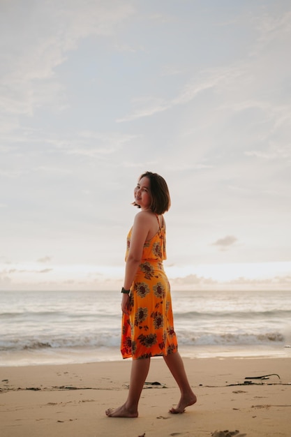 Smile Freedom and happiness asian woman on beach She is enjoying serene ocean nature during travel