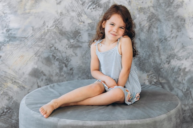 Smile little girl in studio