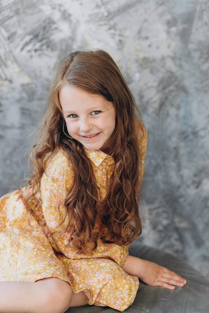 Smile little girl in studio