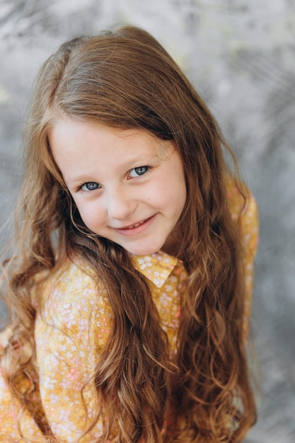 Smile little girl in studio