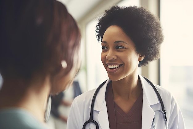 Smiling african american female doctor with patients at hospital