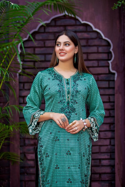 Smiling Asian Girl Portrait Wearing Green Trendy Kurta for Fashion Photoshoot