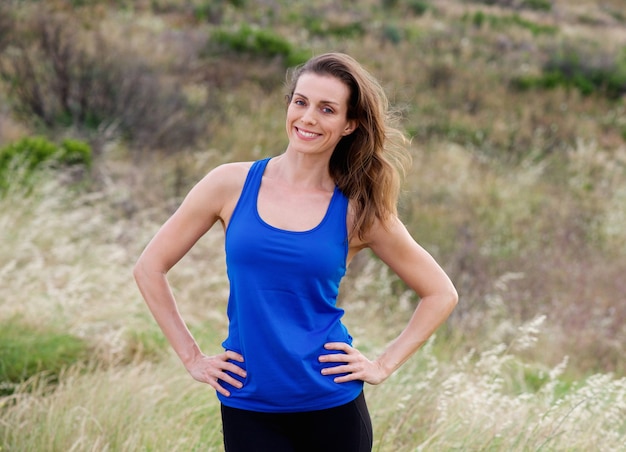 Smiling attractive  woman with blue tank top