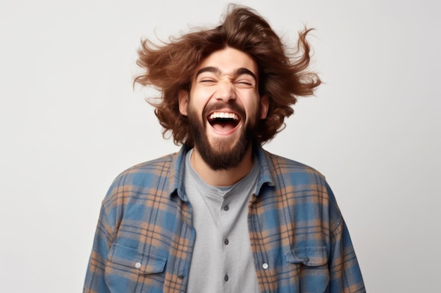 Smiling bearded young male model rejoices coming weekends dressed casually isolated over white background positive pleased student being in good mood after successfully passed exams at college