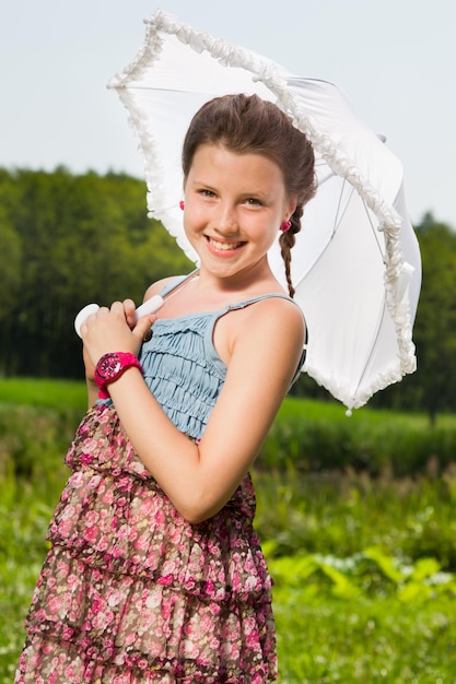 Smiling beautiful girl with umbrella