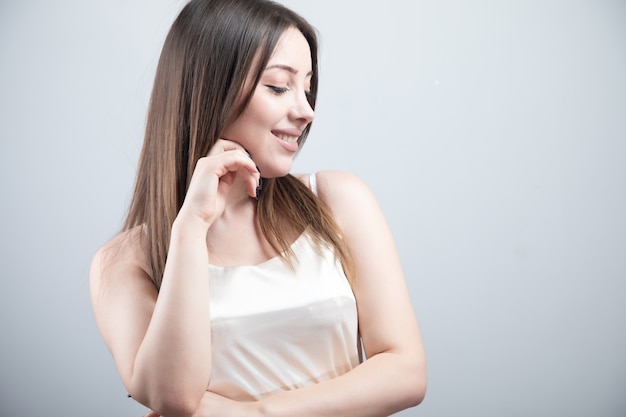 Smiling beautiful young woman with clean fresh skin