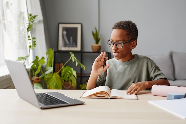 Smiling Boy in Online Lesson