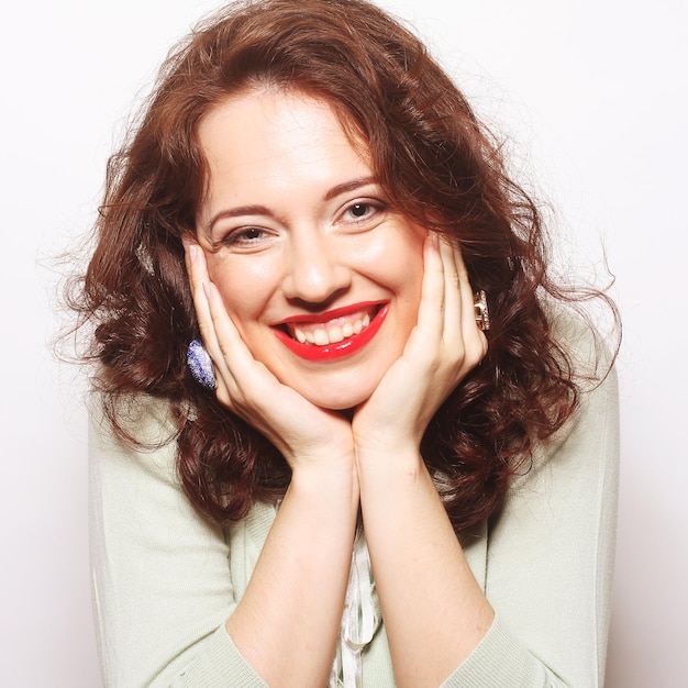 Smiling brunette studio shot