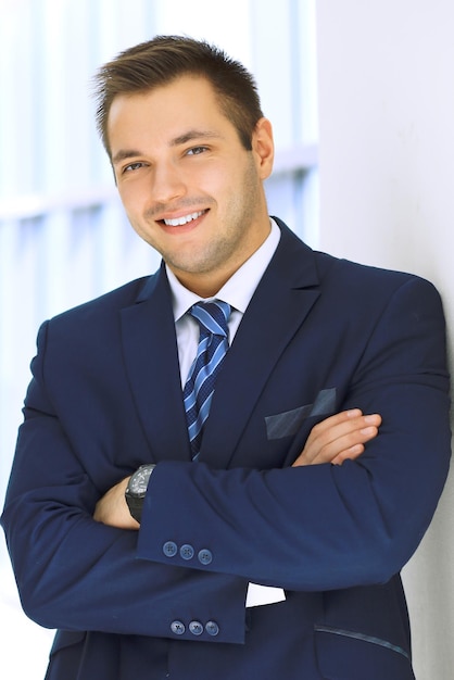 Smiling businessman in office