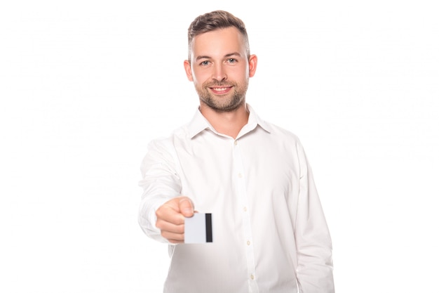 smiling businessman in white shirt presenting credit card isolated on white