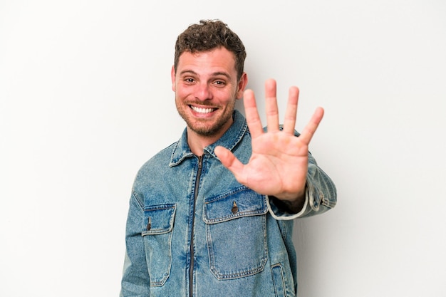 Smiling cheerful showing number five with fingers