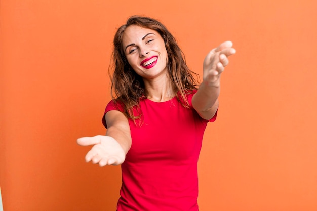 Smiling cheerfully giving a warm friendly loving welcome hug feeling happy and adorable