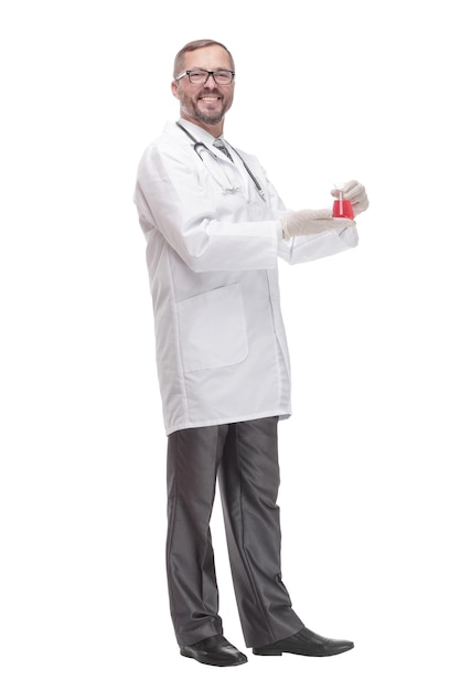 Smiling doctor with a laboratory flask in his hands