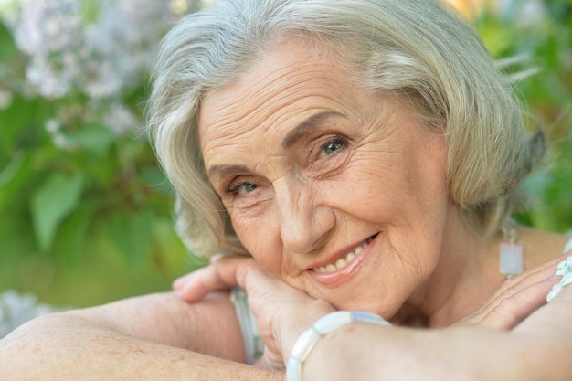 Smiling elderly woman posing