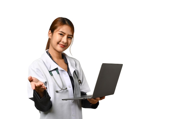 Smiling female doctor holding laptop isolated on white background Medicine technology and health care