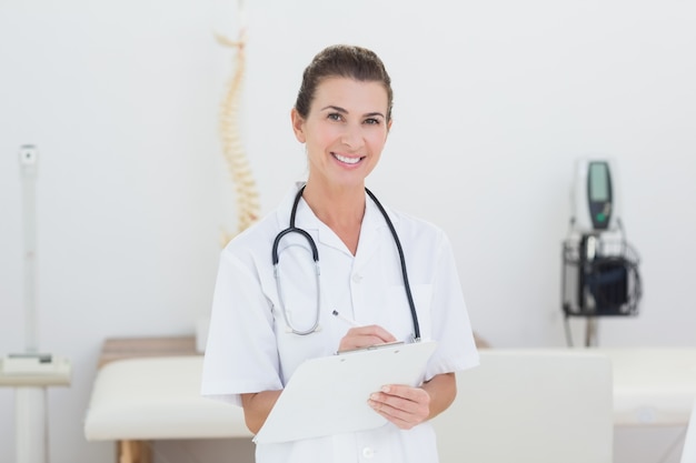 Smiling female doctor looking at camera 