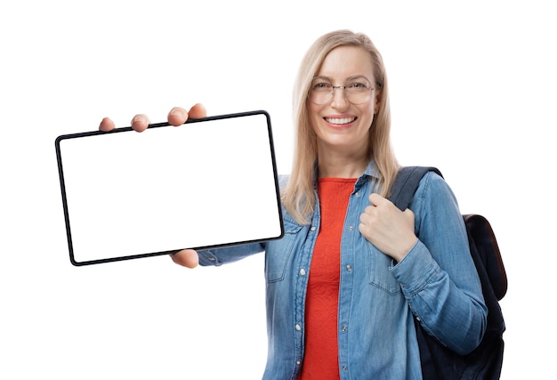 Smiling female student in eyeglasses standing